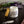 Load image into Gallery viewer, Jar of Purple Ribbon Whipped Tallow Balm on a dark surface with lavender flowers in the background
