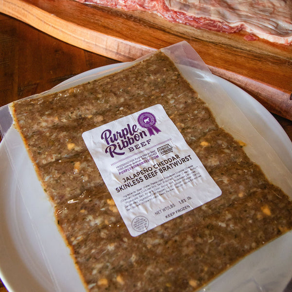 skinless beef brats packaged with skirt steak in back