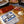 Load image into Gallery viewer, Packaged cheese curds with a salami and sliced meat on a wooden board.