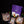Load image into Gallery viewer, A packaged meat gift set displayed on a black background, including three vacuum-sealed cuts of beef, a purple reusable tote bag, small seasoning bottles, and a few packaged accessories. The labels show the brand Beef Heritage.
